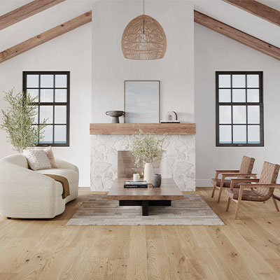 white oak hardwood floors in Scandi style living room with large windows and pops of color